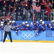 GANGNEUNG, SOUTH KOREA - FEBRUARY 22: USA players celebrate after a 3-2 shoot-out win against Canada in the gold medal game at the PyeongChang 2018 Olympic Winter Games. (Photo by Andre Ringuette/HHOF-IIHF Images)

